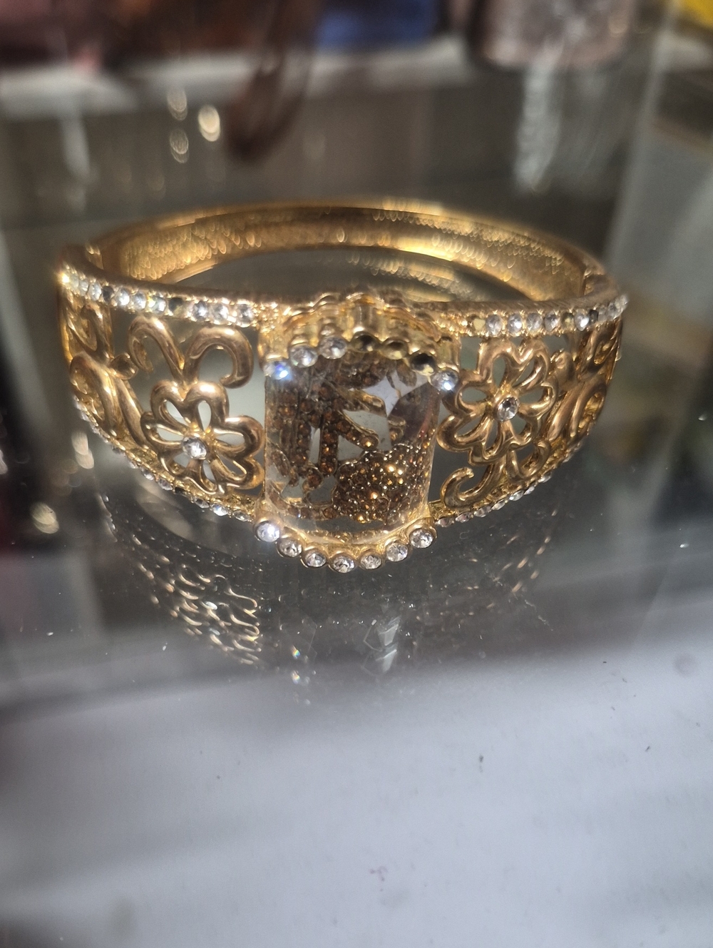 Elegant Gold Floral Bangle Bracelet with Crystal Accent